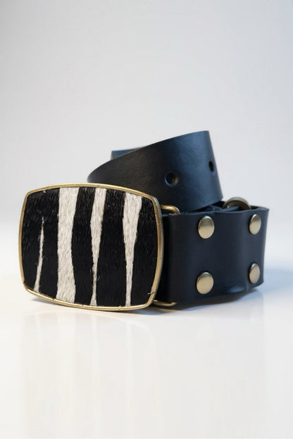Black leather belt with gold accents on a white background