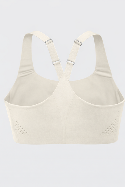Beige sports bra on a light gray background