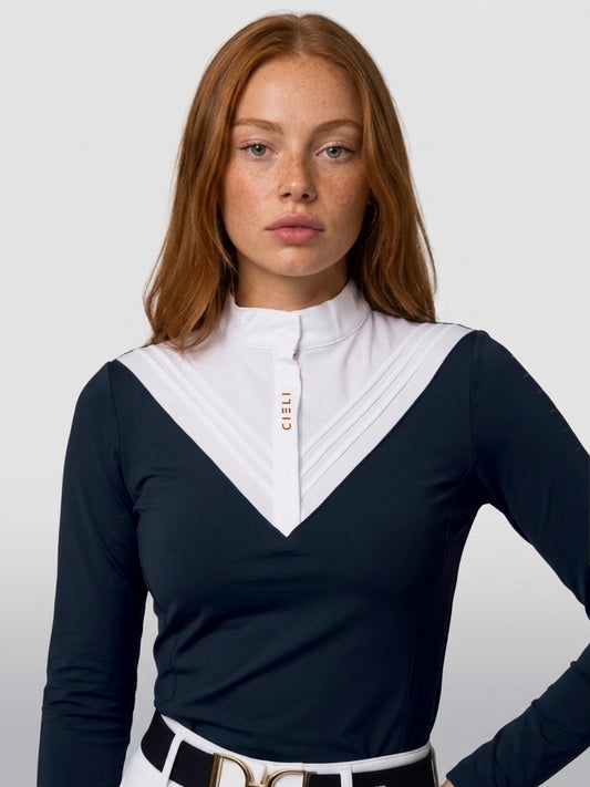 The Lia Show Shirt in navy with a pleated bib, high show collar, and long sleeves.
