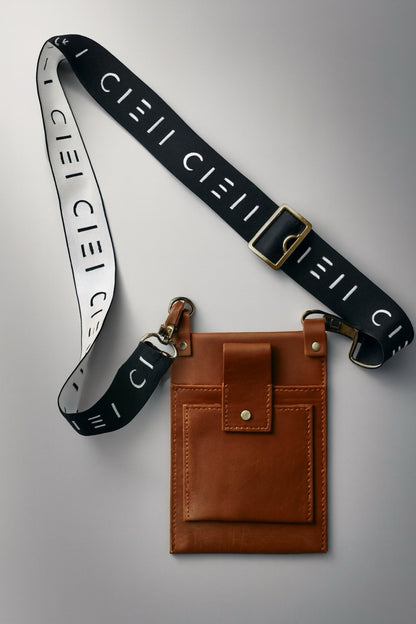 Brown Cieli Signature Leather Sling Bag showing the branded crossbody strap