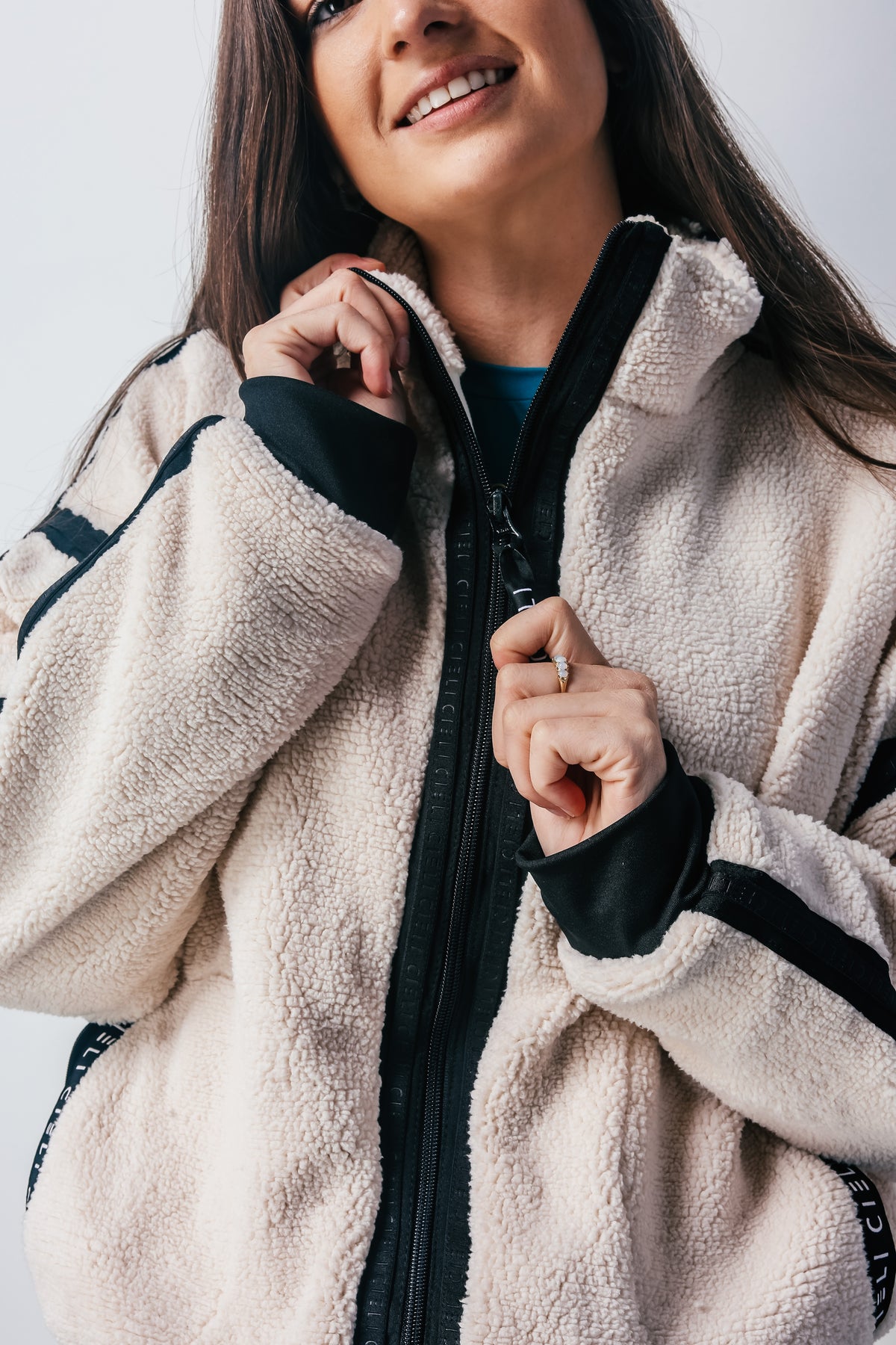 Close up of zip closure of Tina Teddy Jacket