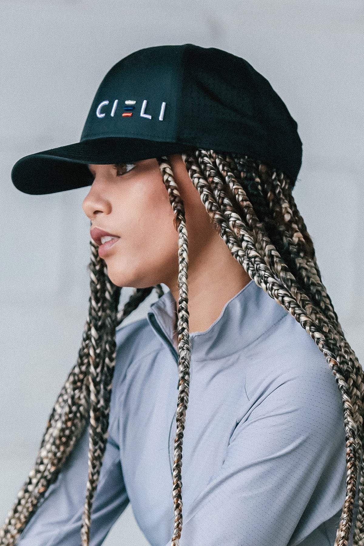 Cieli Signature Cap in Black featuring breathable laser-cut ventilation and embroidered logo.