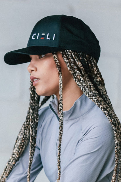 Cieli Signature Cap in Black featuring breathable laser-cut ventilation and embroidered logo.