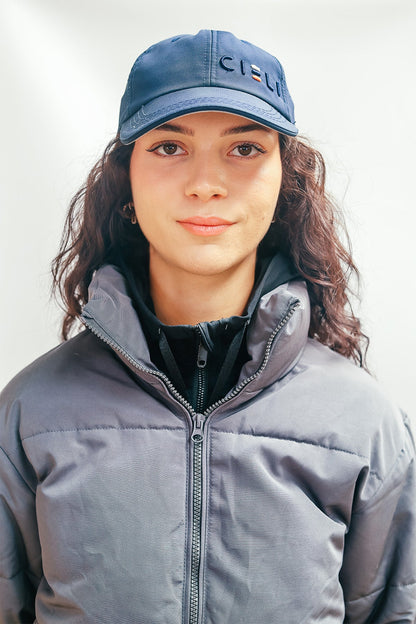 Front view of the Cieli Signature Cap with off-center embroidered Cieli logo.