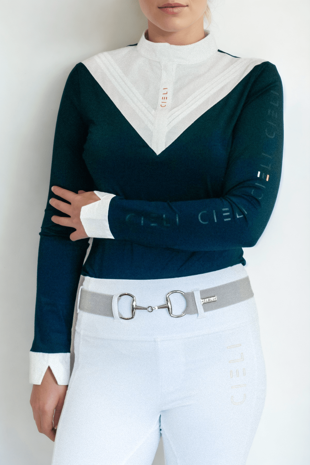 The Lia Show Shirt in Navy with white with pleated bib, long sleeves, and high show collar